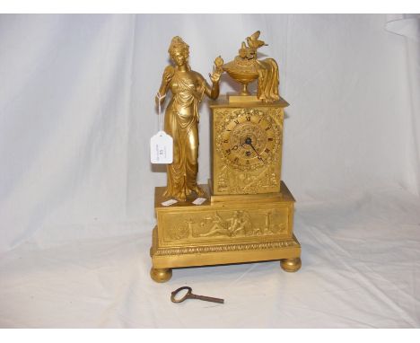 A 19th century French gilt mantel clock with figural mount - 38cm high
