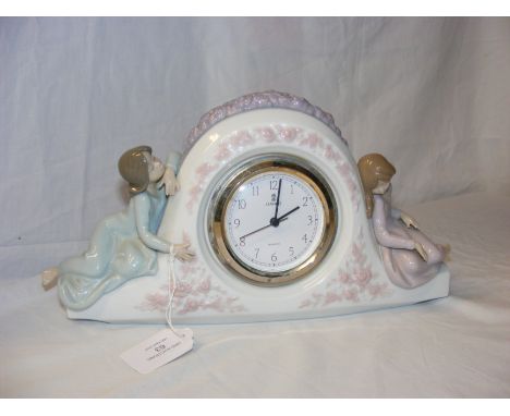 A Lladro mantel clock, model No.5776 - width 33cm CONDITION REPORT workinggood conditionOur team of trusted experts are on ha