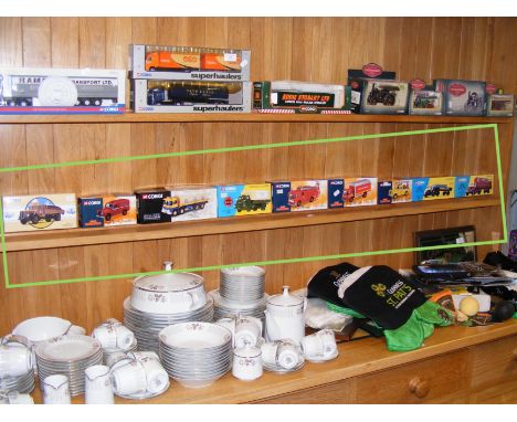 A quantity of Corgi die cast model vehicles - on one shelf 