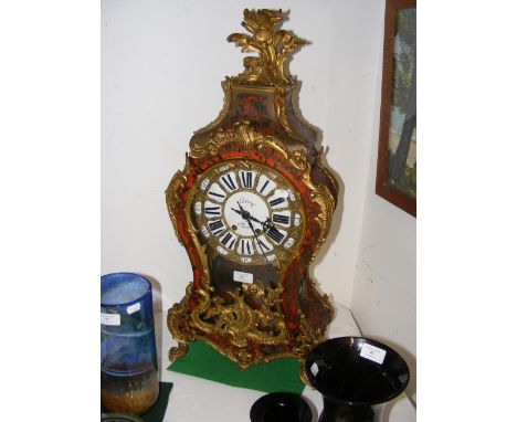 A French Boulle work clock in decorative gilt surround by Leroy, Paris - 72cm high 