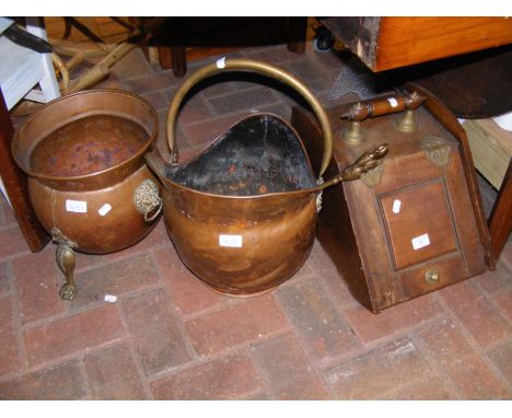 An antique Victorian copper and brass helmet coal scuttle, together with wooden coal scuttle and brass and copper cauldron  