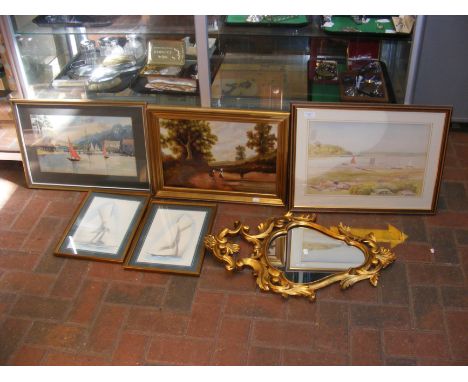 A gilt scroll wall mirror together with assorted sailing pictures and others