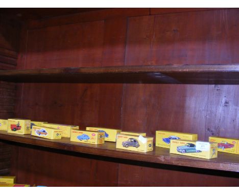 A selection of twelve new boxed reproduction Dinky toys