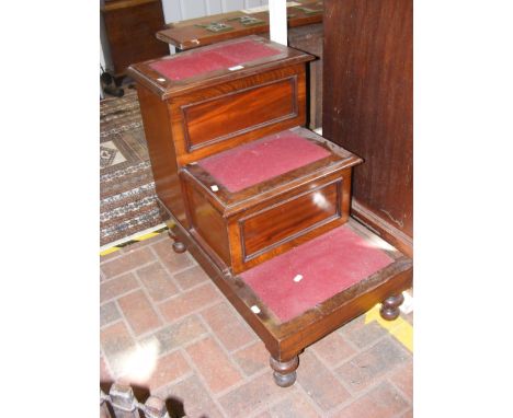 A set of Victorian library steps (the top step hinged)