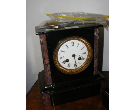 A Victorian slate and marble mantel clock with striking movement - 24cm high