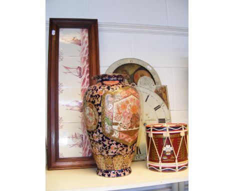 A sun/moon clock face for a Grandfather clock, framed Dutch Delft tiles depicting sailing boats, a large Japanese Imari porce