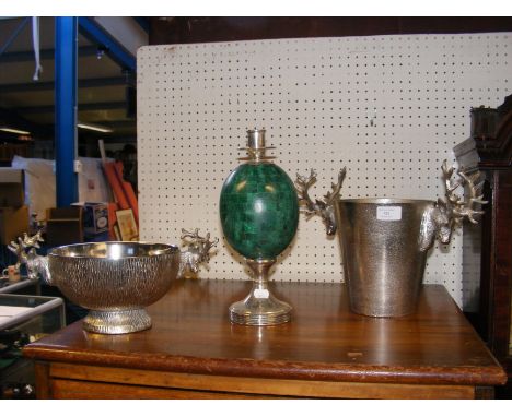 Two modern ice buckets, together with an unusual candlestick