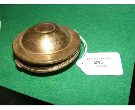 A vintage 1950s goldtone finish Kigu flying saucer compact