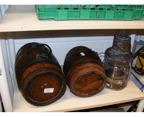 Two Welsh oak cider/harvest barrels, together with copper and brass ship's lantern 