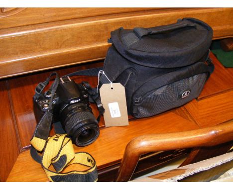 A Nikon D40 Camera, together with soft case accessories 