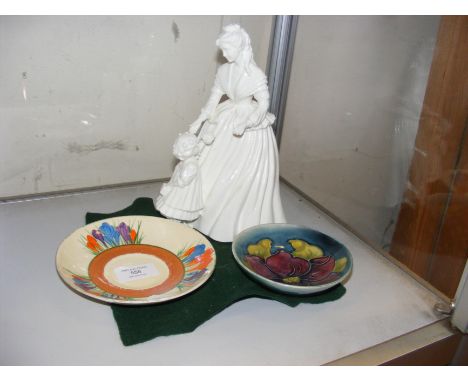 A Moorcroft pin dish, Clarice Cliff Crocus pattern saucer together with a Royal Worcester figurine