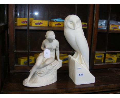 A Copeland Parian ware figure 'Marshall', together with a carved stone owl ornament CONDITION REPORT In our judgement, condit