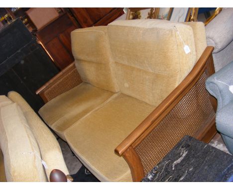 A contemporary Bergere three seater sofa with yellow cushions - length approx. 190cm