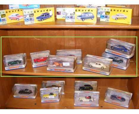 A selection of seven boxed Dinky die cast vehicles including the 1973 MGBGT 