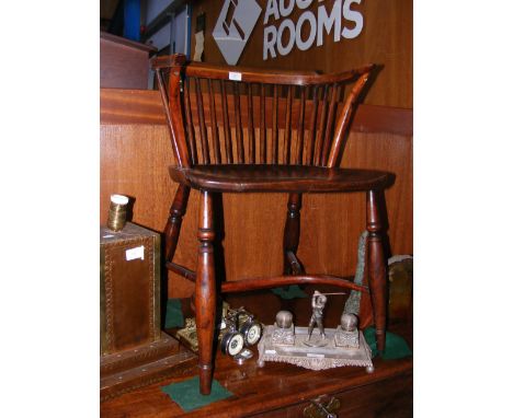 A Welsh style stick back antique armchair with crinoline stretcher 