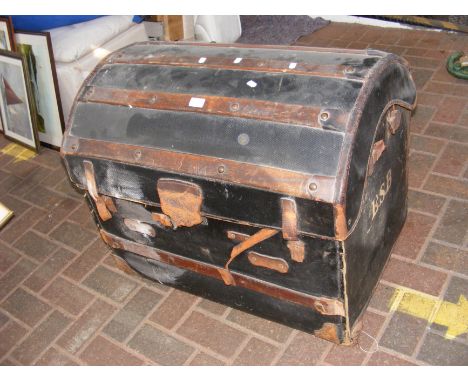 A vintage slatted wood domed trunk