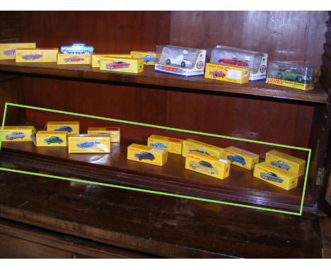 A selection of twelve new boxed reproduction Dinky toys