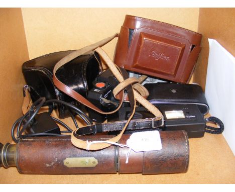 A selection of vintage cameras, including Rollei, Voigtlander and Petri, together with an old telescope  