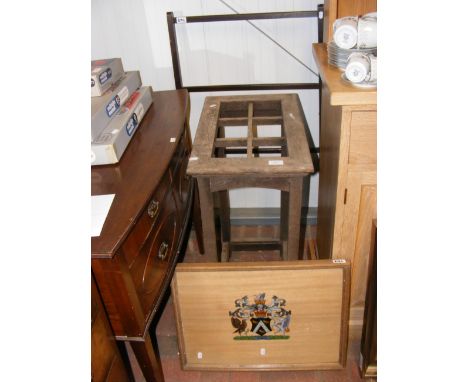 An oak umbrella and stick stand, together with a towel rail and crest picture 