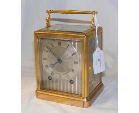 A 19th century French gilt brass carriage clock attributed to Paul Garnier of Paris - the four glass case with front sliding 