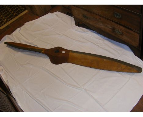 An old wooden propeller manufactured by Airscrew Howden for their cruiser aircraft, having makers mark and impress Hermes IV 