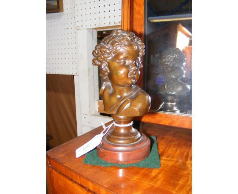An antique bronze bust on marble plinth of small child, signed Francois - 17cm high