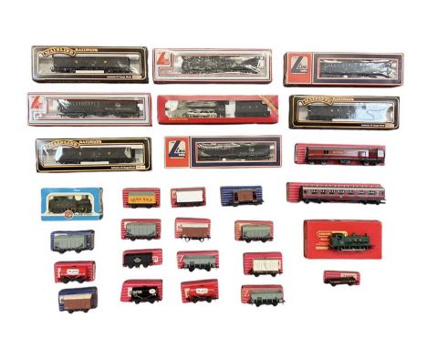 A collection of boxed OO rolling stock and engines including three Mainline Railways wagons, three Lima model wagons, a Hornb