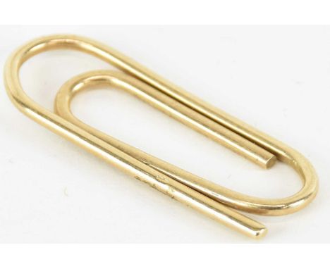 A 9ct gold money clip in the form of a paperclip, length 4.3cm, approx 5.3g.