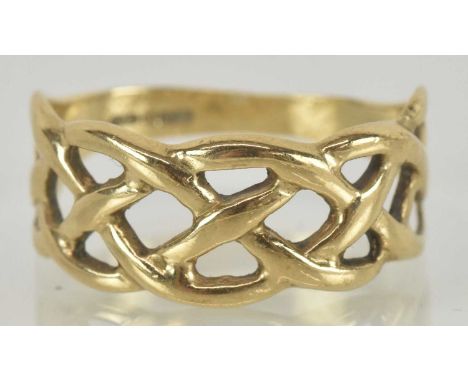 A 9ct gold open trellis ring in the Celtic form, size R, approx 3.1g.