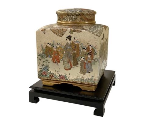 A Japanese Meiji period Satsuma tea caddy of square form, with slightly rounded shoulders and fitted with an inner and outer 