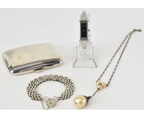 A hallmarked silver cigarette case, Birmingham 1924, maker's initials 'RN', a silver gate link bracelet, a Gucci stainless st