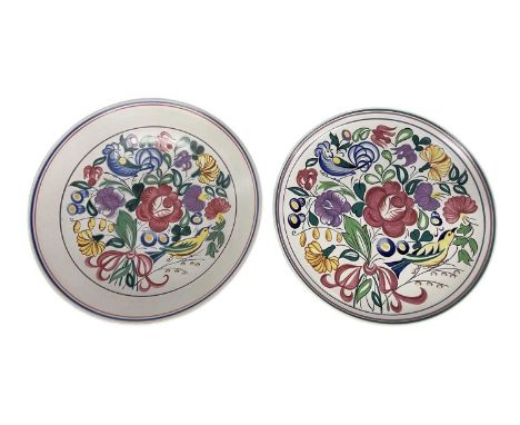POOLE POTTERY; an art pottery charger, decorated in the 'Bluebird' pattern, diameter 34cm, and a matching 'Bluebird' pattern 