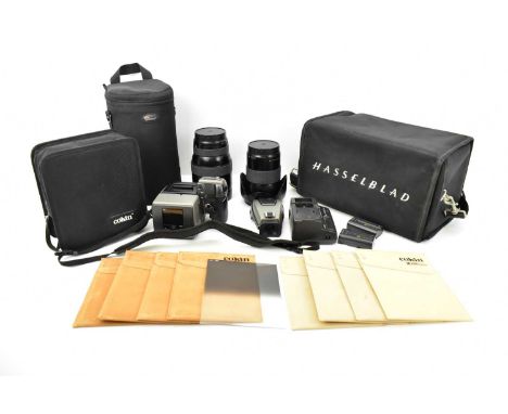 HASSELBLAD; a full camera system comprising a H1D body and prism, serial no. IX04212047, a Sony AC adapter/charger, model AC-