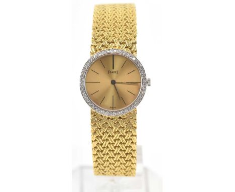 PIAGET; an 18ct yellow gold lady's wristwatch, the dial surrounded by forty-eight brilliant cut diamonds totalling approx 0.3