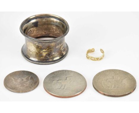 A hallmarked silver napkin ring, approx 9.7g, 1971 and 1977 dollar coins, a 1964 half dollar coin and a small 9ct gold ring w