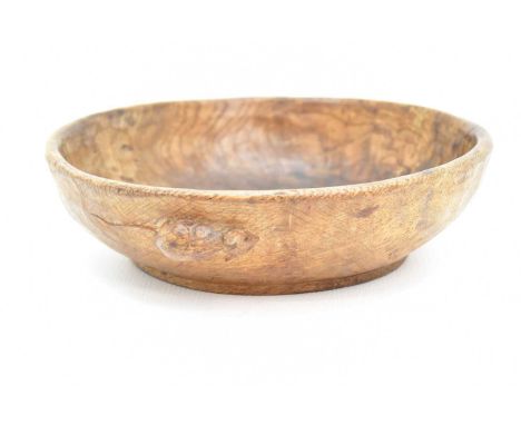 ROBERT 'MOUSEMAN' THOMPSON OF KILBURN; a carved oak fruit bowl, with signature mouse to the side, height 6.5cm, diameter 23cm