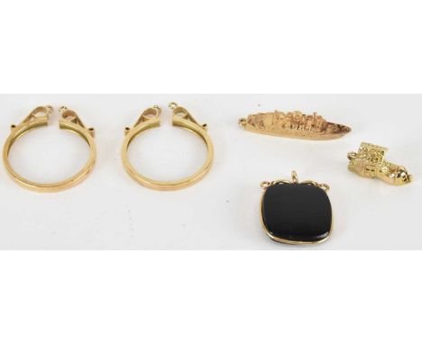 Three 9ct gold charms comprising 'MS Patricia' cruiseliner, length 3cm, an 'Old Woman Who Lived in a Shoe', with hinge reveal