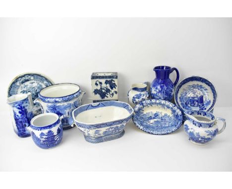 Twelve items of mixed blue and white transfer pottery including a planter, height 20cm, four jugs, tallest height 19cm, vario