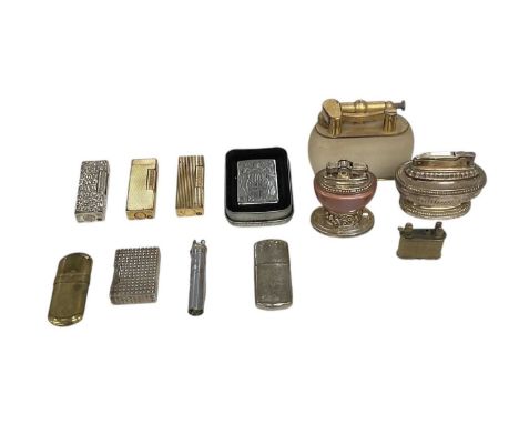 A collection of twelve assorted lighters and table lighters including four Dunhill lighters, Ronson table lighter, further Ro