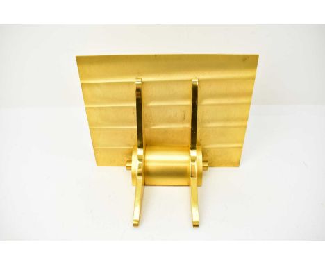 JAEGER-LECOULTRE; a gilt brass wall bracket for an Atmos clock, top measures 21.5 x 17cm.