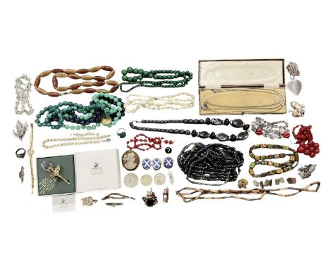 A group of modern and vintage costume jewellery including silver rings, Native American style silver necktie, 1884 silver dol