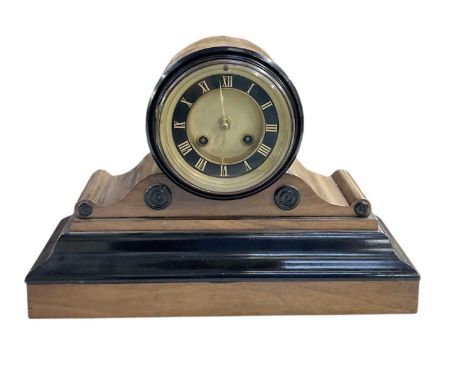 A late 19th/early 20th century walnut and ebonised mantel clock, the black painted dial set with Roman numerals, height 22cm,