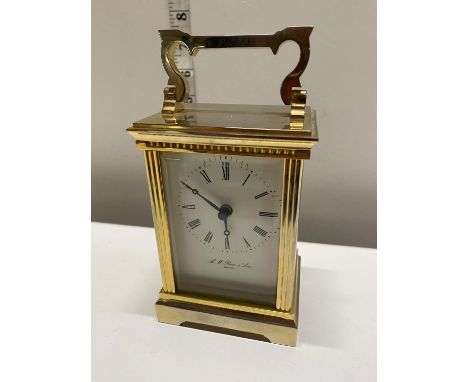 A heavy brass A.M. Row &amp; Son Ripon carriage clock (battery powered) 