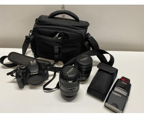 A Canon EOS 600D camera body with two canon lenses (zoom lens EF70-300mm and a EFS 15-85mm lens) with a canon speedlite 430 E