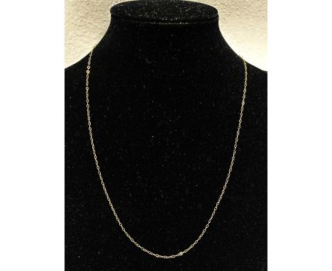 A 9ct gold chain. 0.38 grams. 