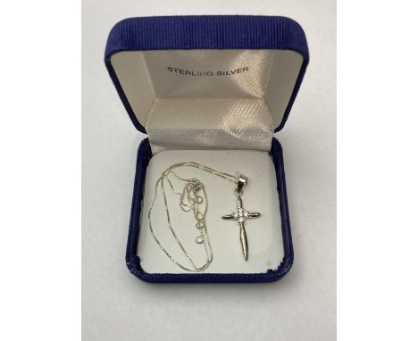 A 925 silver cross and chain 