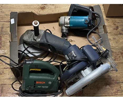 A selection of assorted power tools, shipping unavailable
