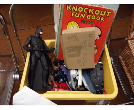 Collection of vintage toys and annuals