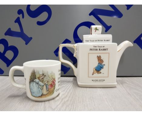 THE TALE OF PETER RABBIT BEATRIX POTTER TEAPOT TOGETHER WITH WEDGWOOD PETER RABBIT CUP