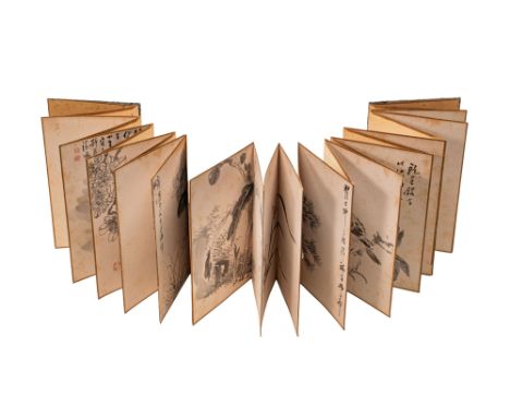 Ca. AD 1793 - 1841. An album of floral paintings by Watanabe Kazan, presented in a traditional cloth-bound format with handwr